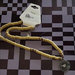 Yellow Beaded Necklace with Silver Pendant